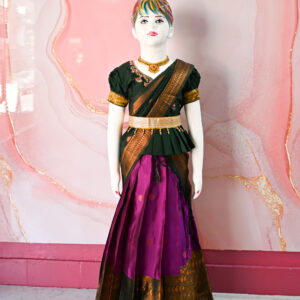 A traditional Indian Pattu Pavada (lehenga) in a vibrant Violet with forest Green.