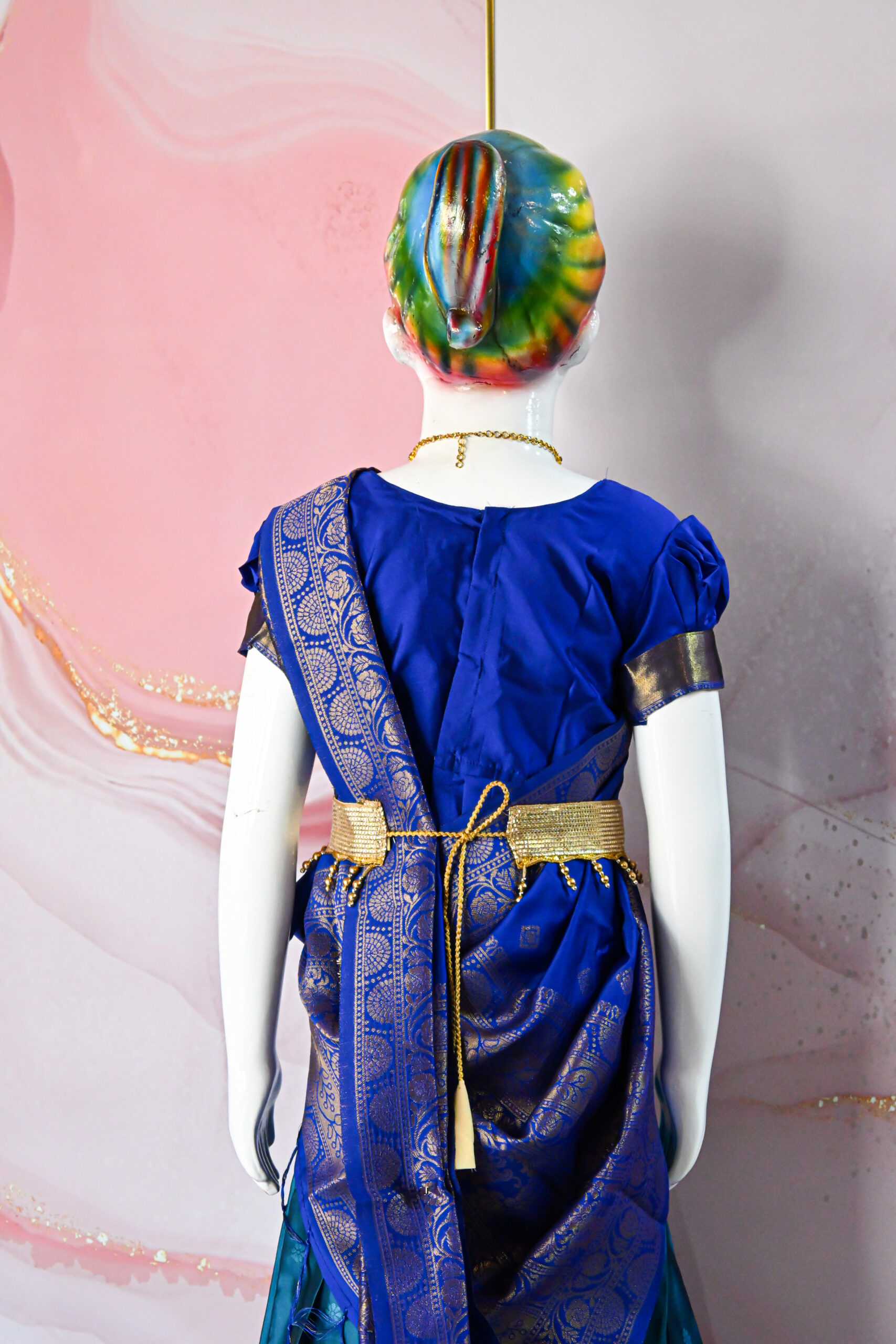 A traditional Indian Pattu Pavada (lehenga) in a vibrant Teal Blue with Royal Blue.