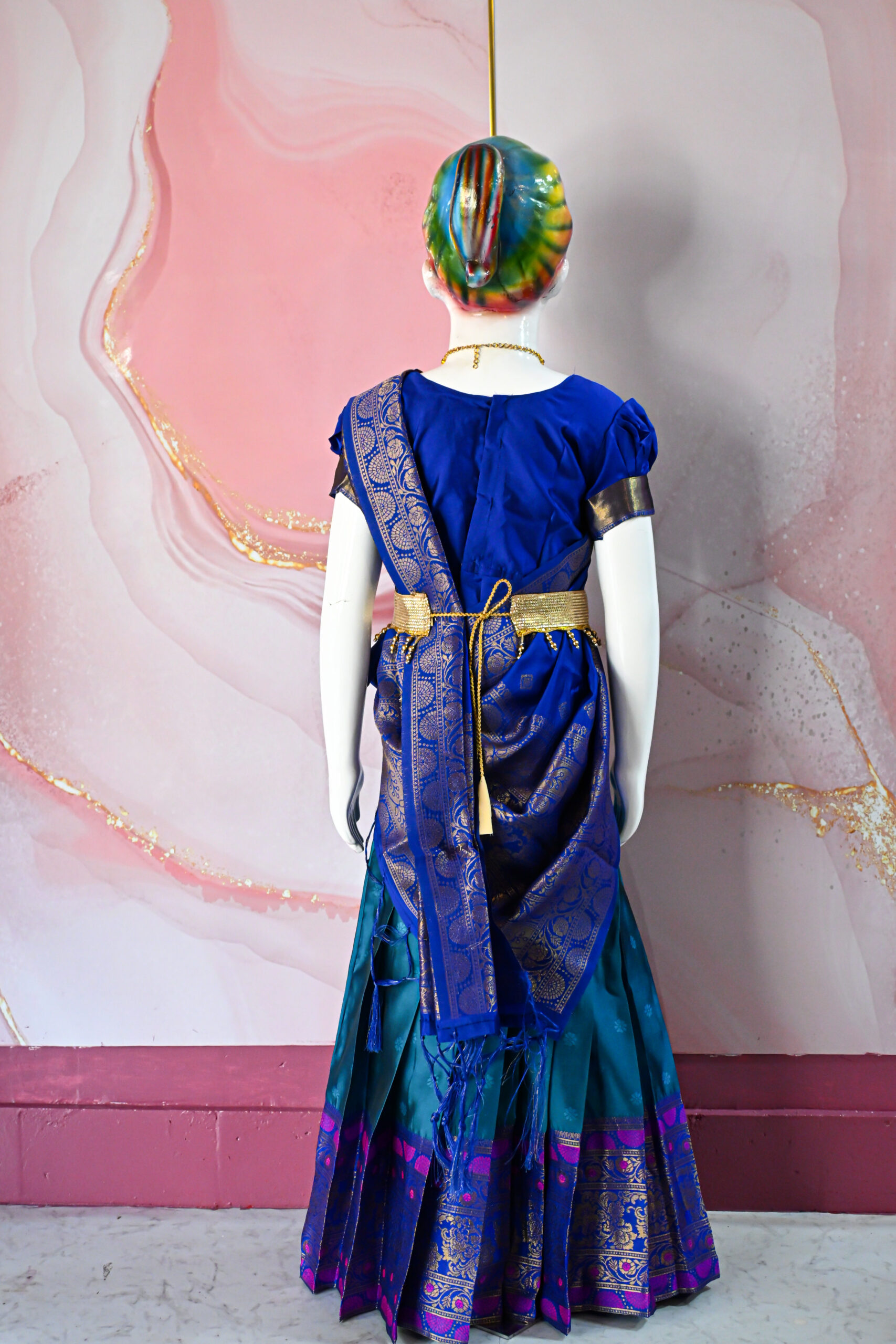 A traditional Indian Pattu Pavada (lehenga) in a vibrant Teal Blue with Royal Blue.