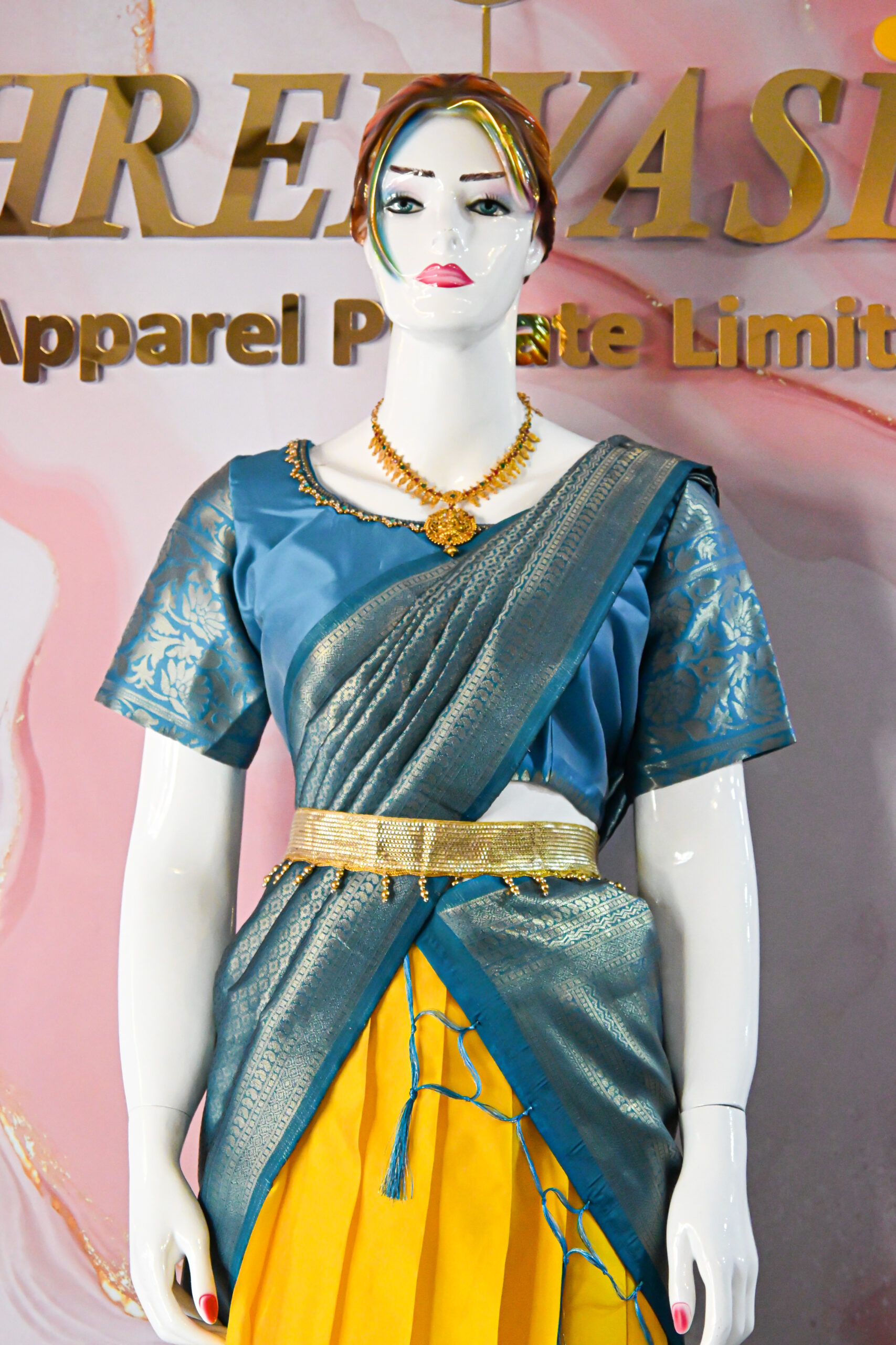 A traditional Indian Pattu Pavada (lehenga) in a vibrant Yellow with Blue.