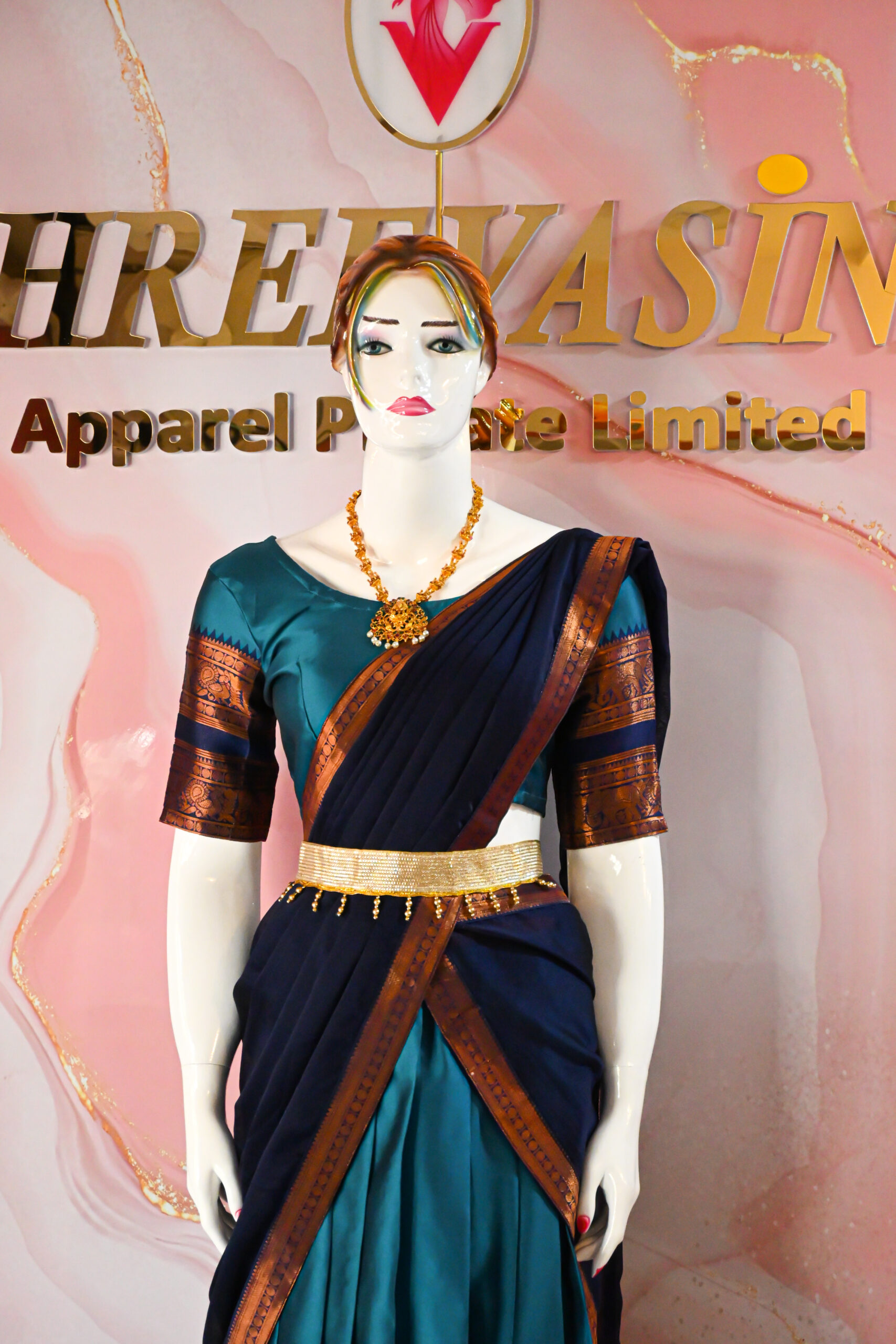 A traditional Indian Pattu Pavada (lehenga) in a vibrant ( Teal blue with navy Blue & Forest green with navy Blue )