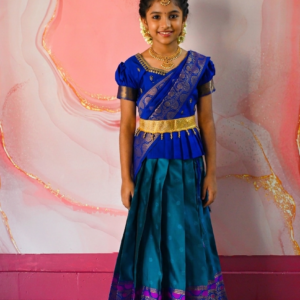 A traditional Indian Pattu Pavada lehenga in a vibrant Teal Blue with Royal Blue