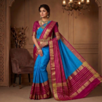 Deep Red body with a soft, muted Peach-Gold border and pallu.