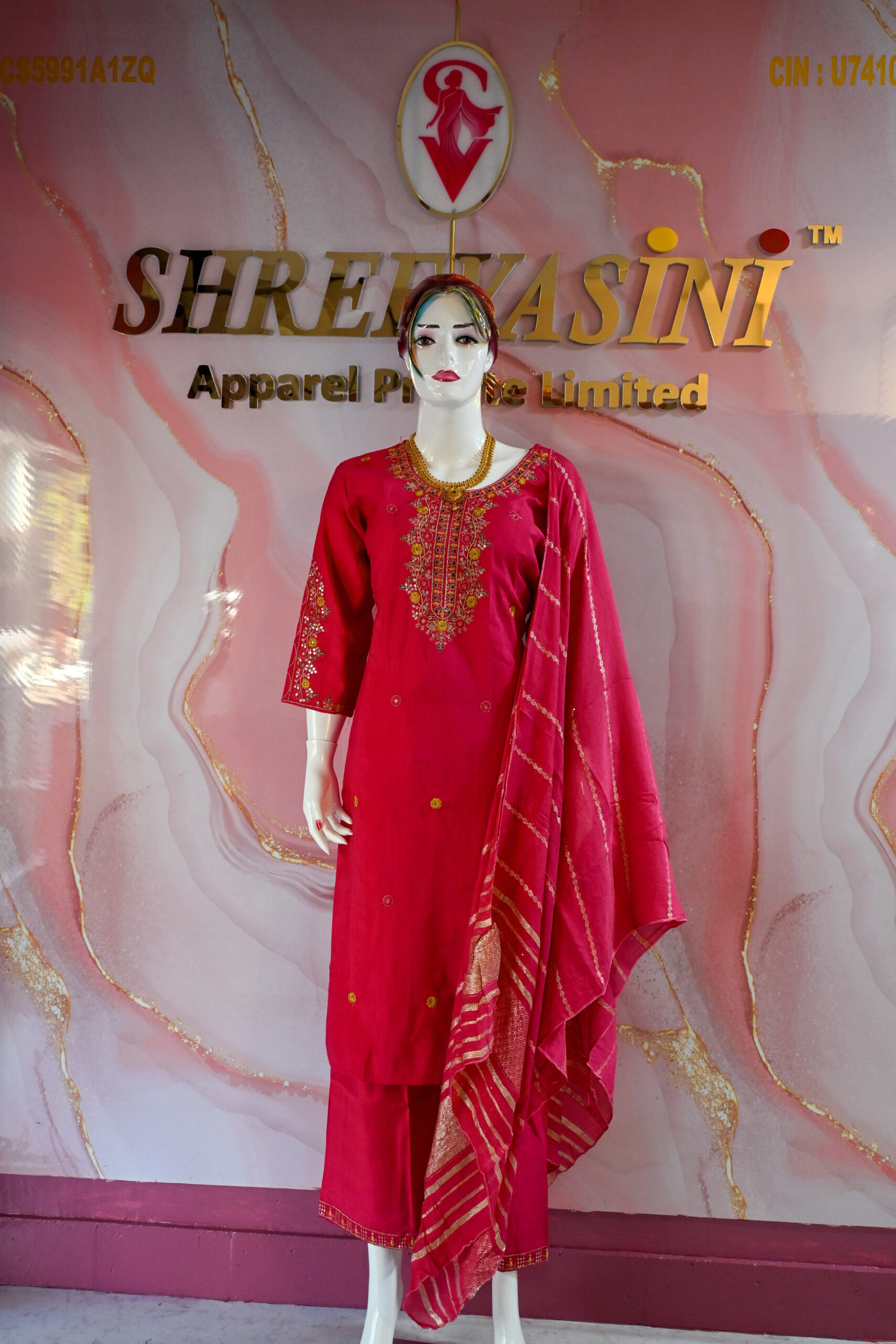 A three-piece Indian Premium Party Wear Chudidhar Suit