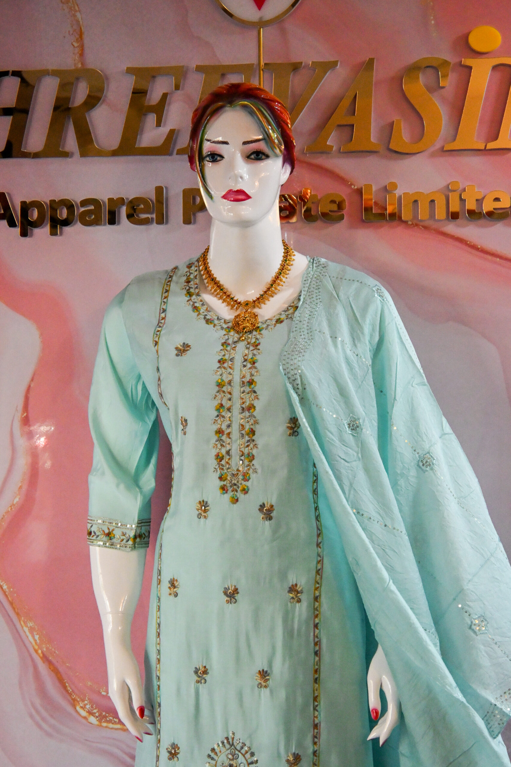A three-piece Indian Premium Party Wear Chudidhar Suit