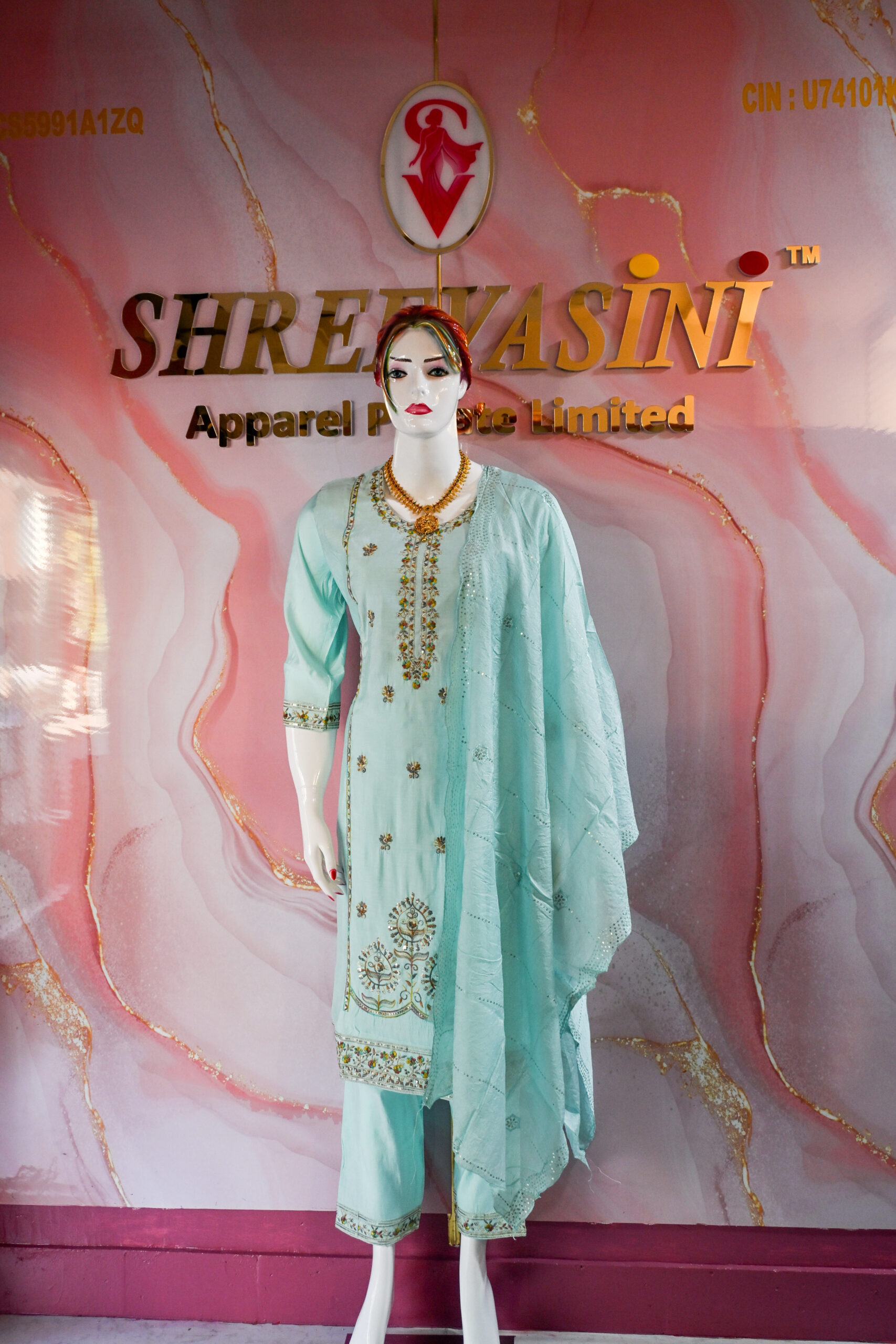 A three-piece Indian Premium Party Wear Chudidhar Suit
