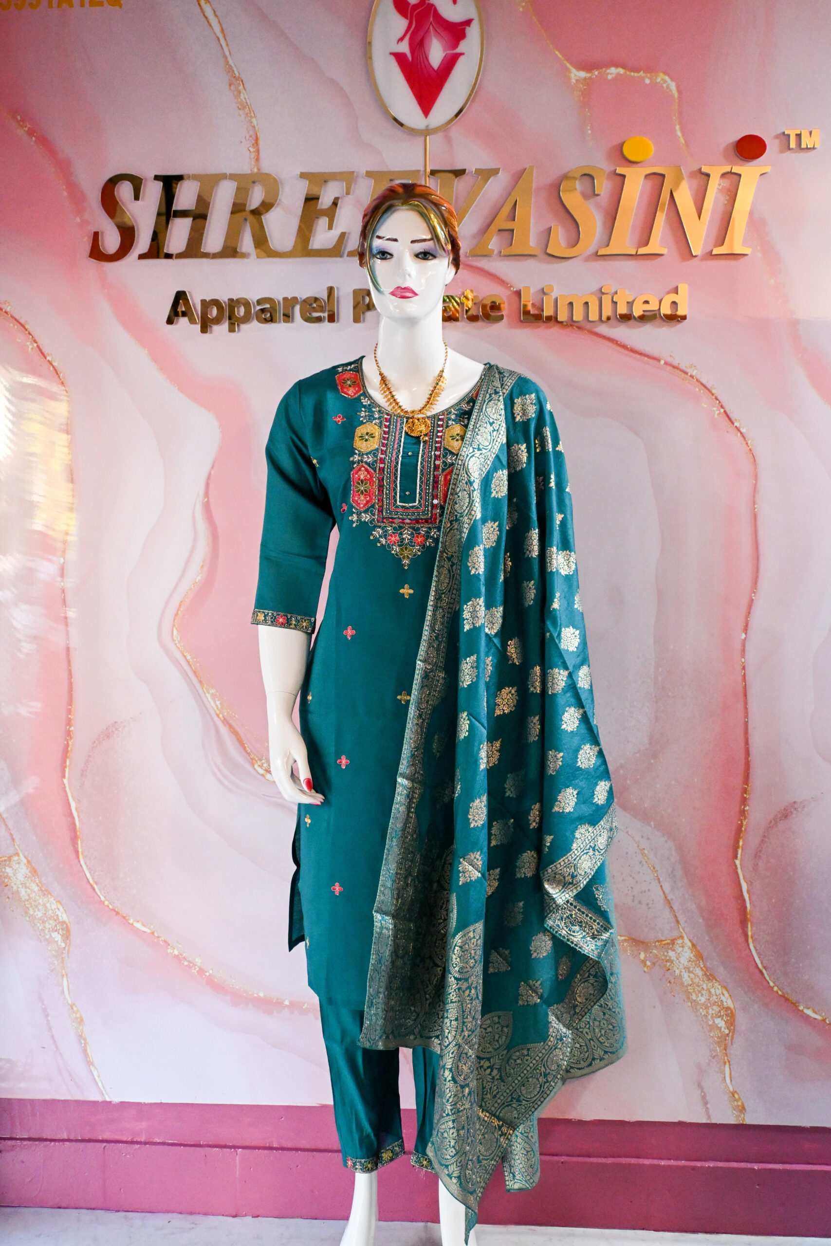 A three-piece Indian Premium Party Wear Chudidhar Suit