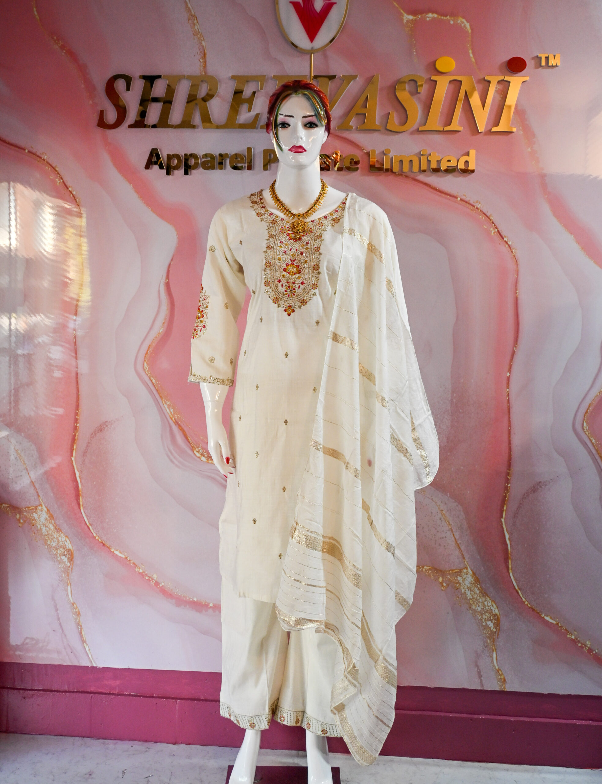 A three-piece Indian Premium Party Wear Chudidhar Suit