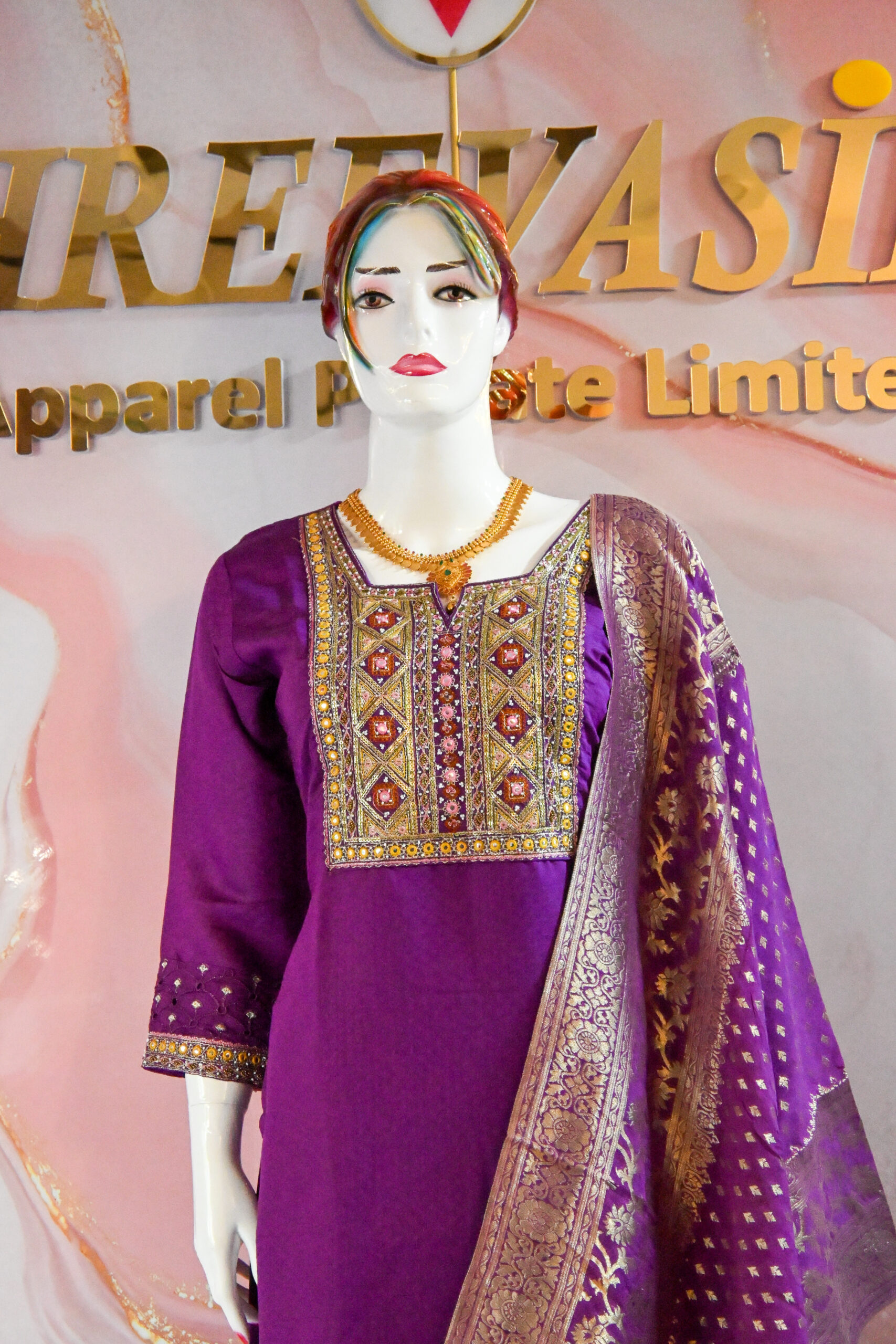 A three-piece Indian Premium Party Wear Chudidhar Suit