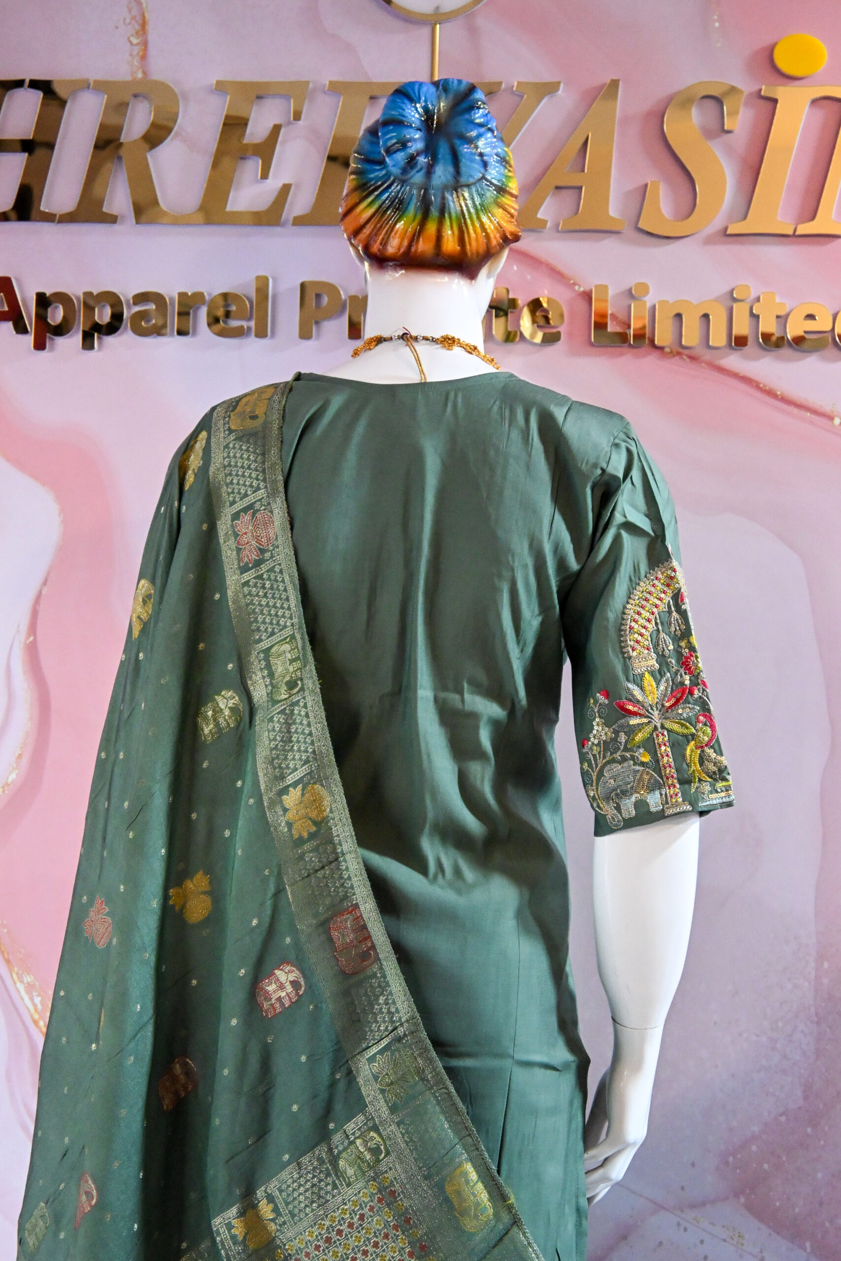 A three-piece Indian Premium Party Wear Chudidhar Suit