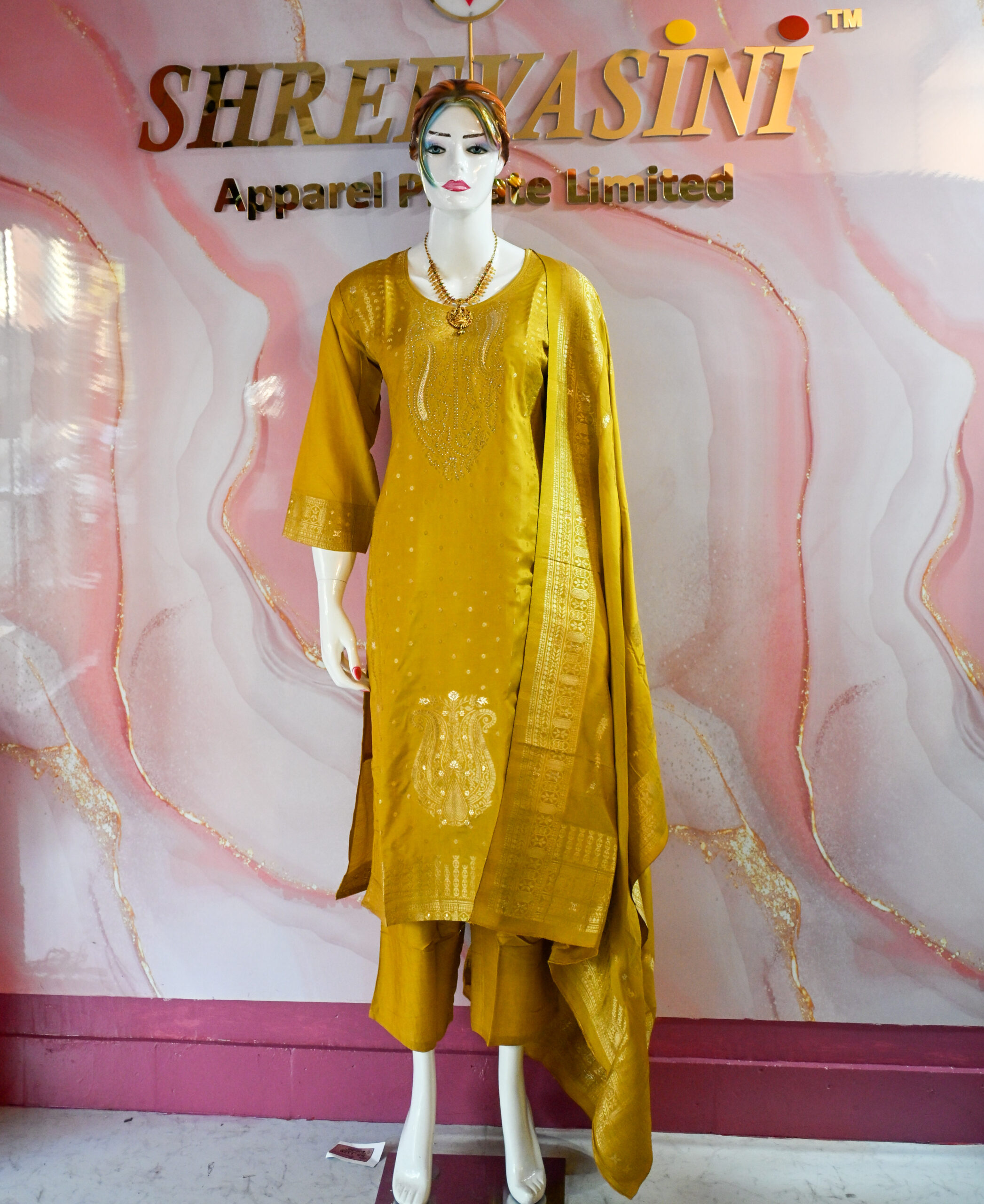 A three-piece Indian Premium Party Wear Chudidhar Suit